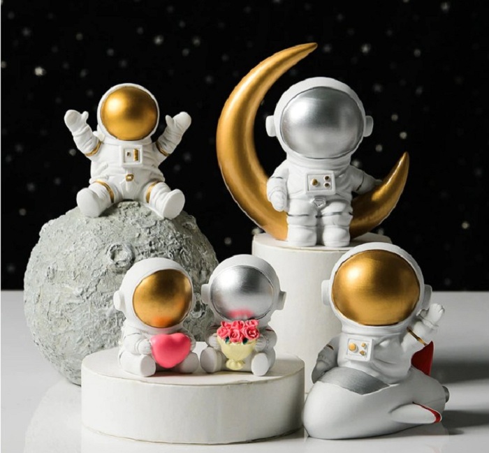 escultura astronauta