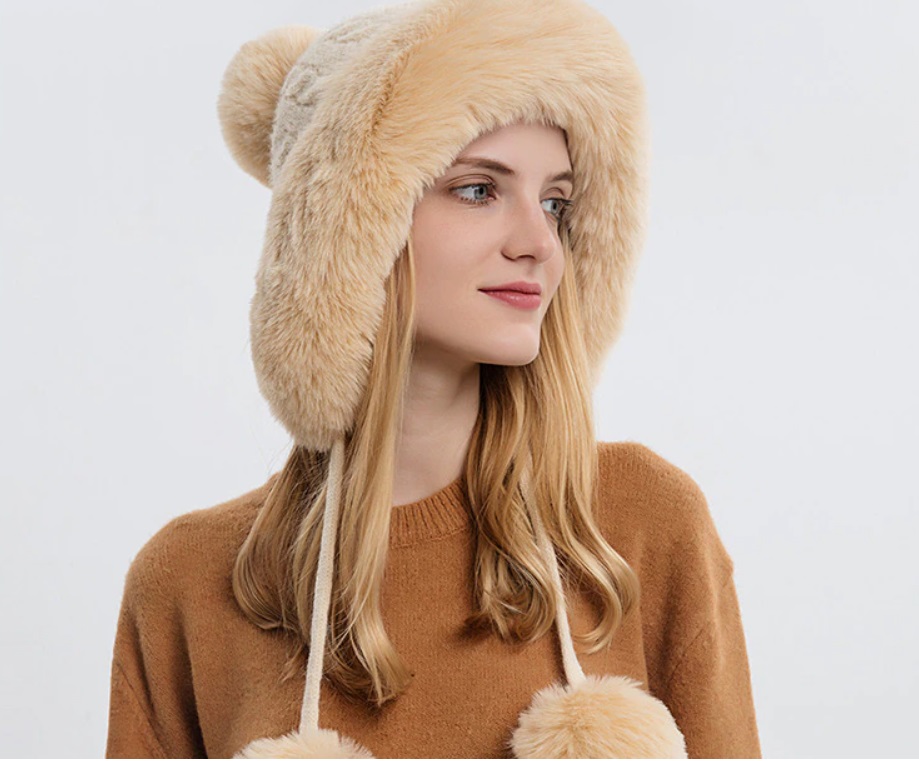 gorro con pompones