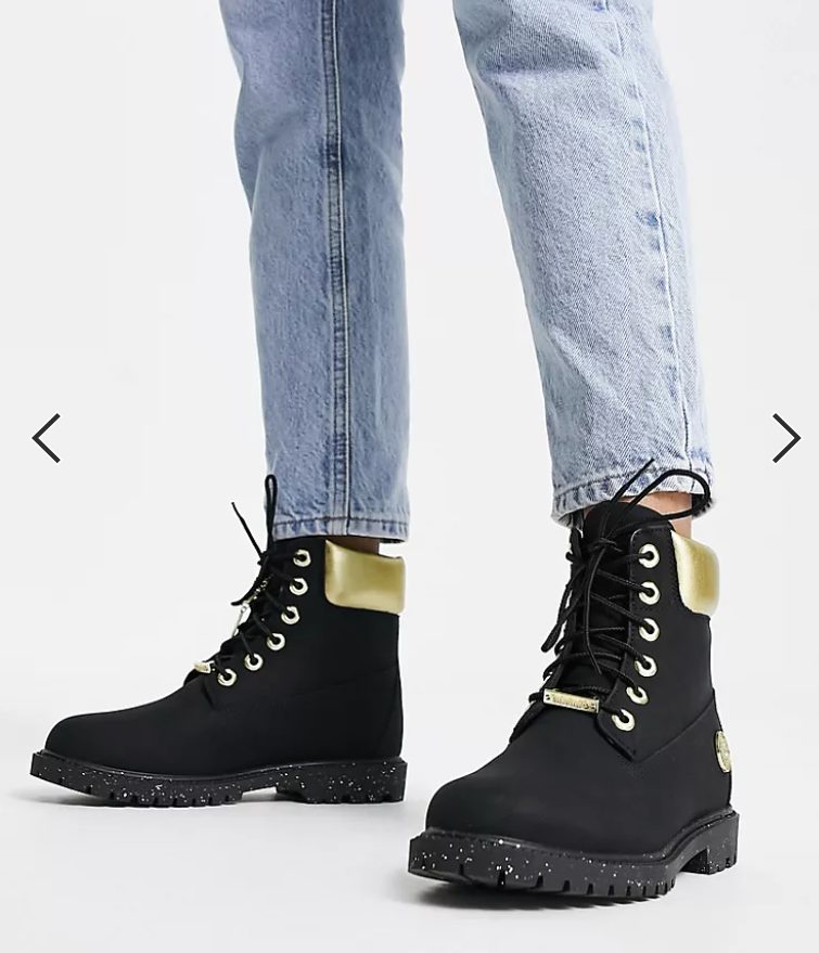 botas negras doradas