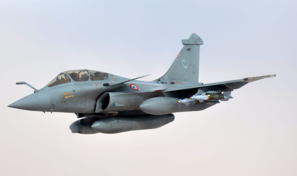 A French air force Rafale aircraft breaks formation after refueling from a U.S. Air Force KC 135 Stratotanker aircraft assigned to the 351st Expeditionary Air Refueling Squad Moncloa