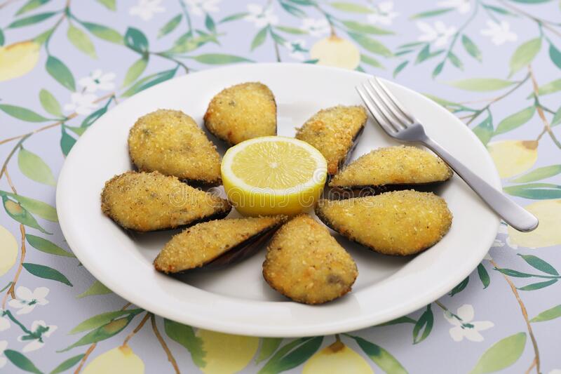 sacar carne mejillones tigre