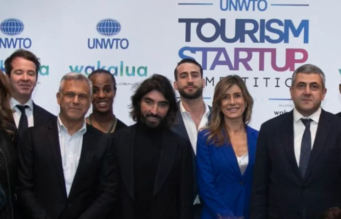 En primera fila, Barrabés, Javier Hidalgo, Begoña Gómez y Zurab (OMT) en un evento.