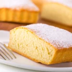 Este es el bizcocho que te hacía tu madre y que perfumaba toda la casa. Te doy la receta para que te salga así de esponjoso