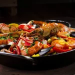 El sacrilegio científico que mejora la paella: añadir bicarbonato al caldo para un ‘socarrat’ infalible
